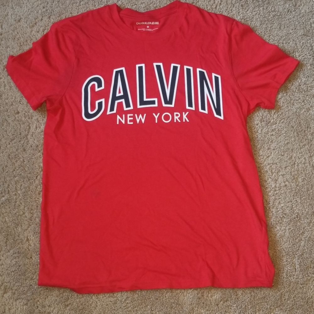 Red Calvin Klein shirt